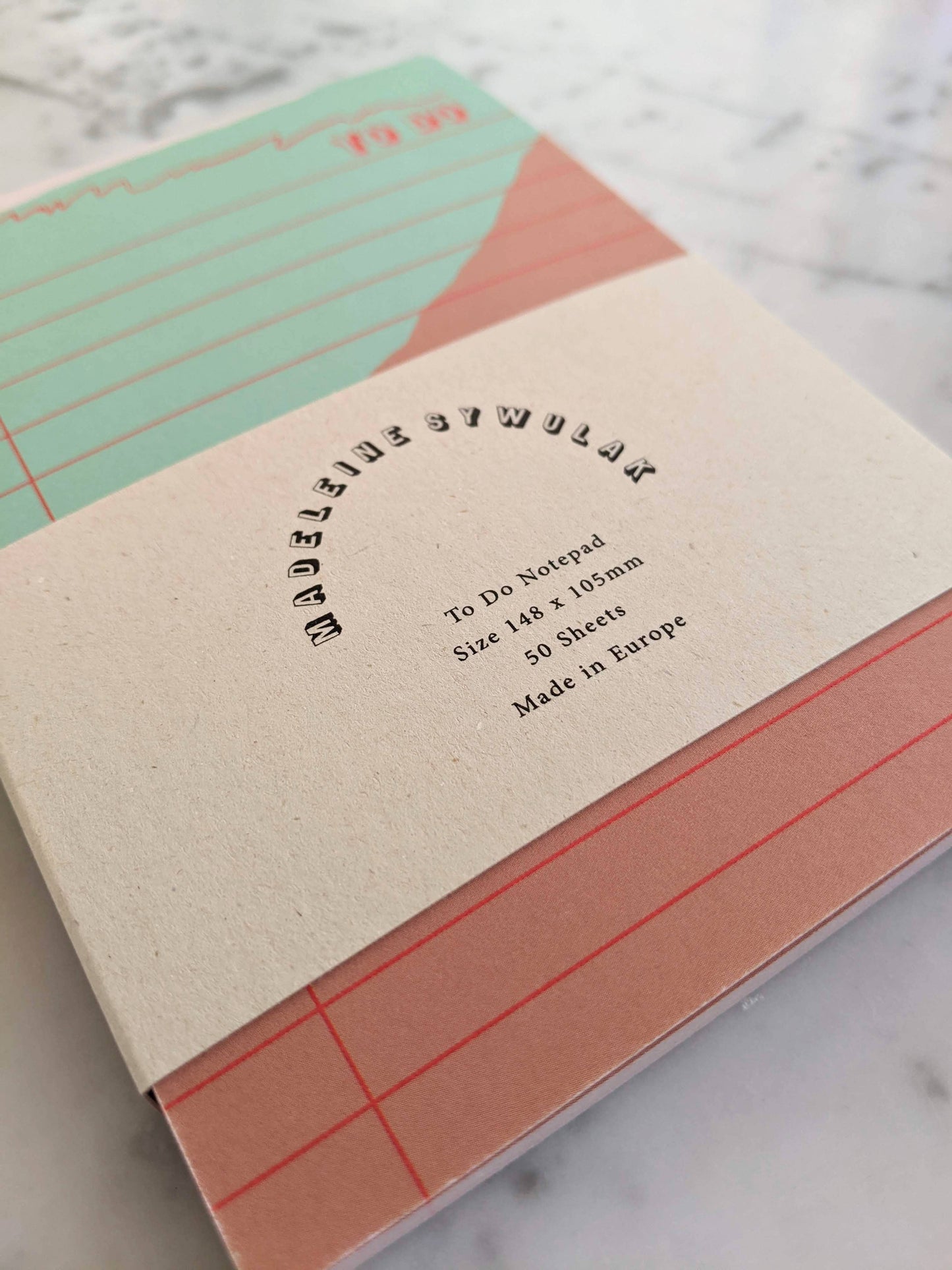 50 sheet to-do notepad in seafoam, bronzer and bright red.