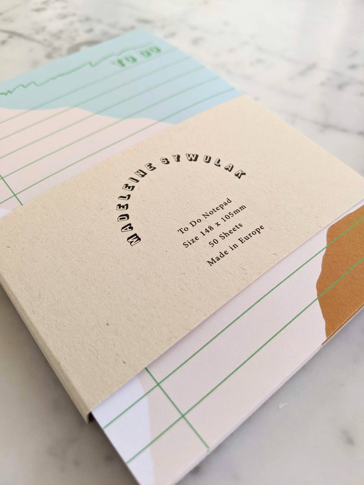 50 sheet to-do notepad in light blue, ginger and bright green.