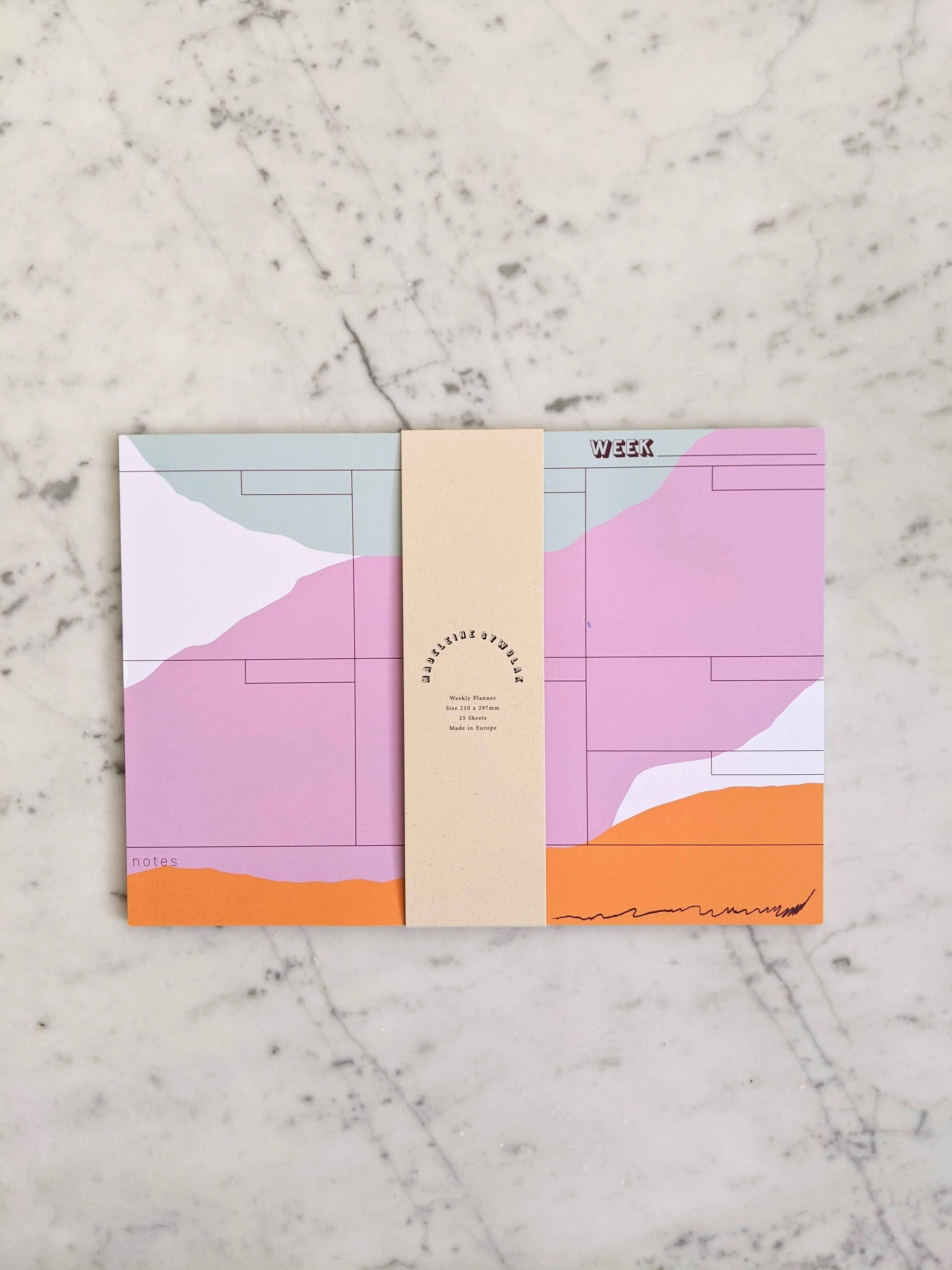 25 sheet weekly planner in mint, mauve and pumpkin.