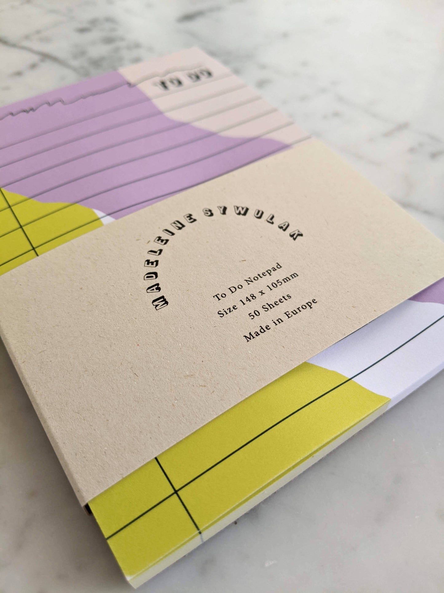 50 sheet to-do notepad in citron, lavender and dark green.