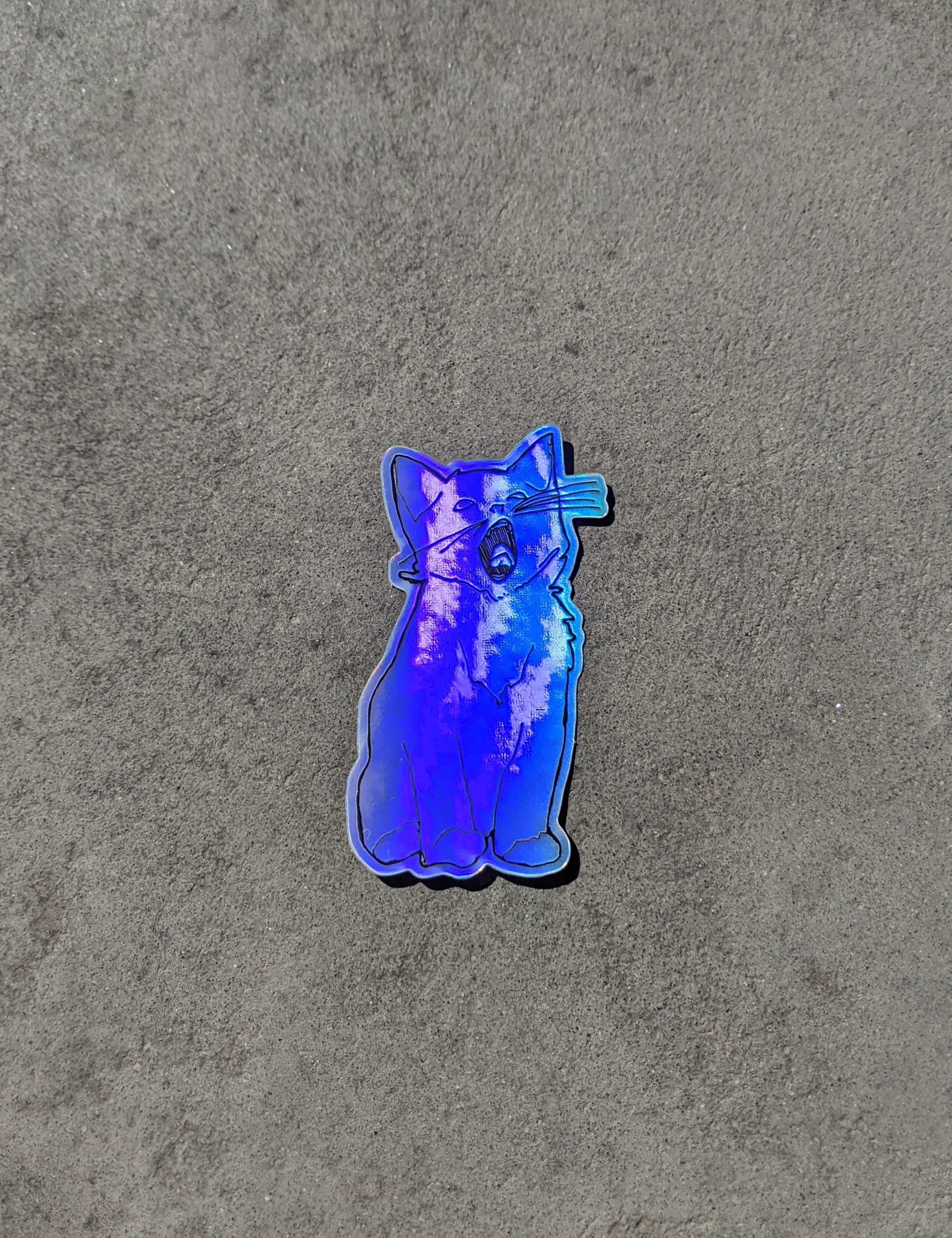 Holographic yawning kitten sticker.